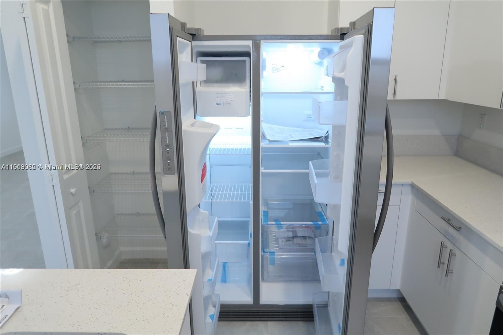 12946 Southwest 231st Street Miami, FL 33170 - Photo 18 of 42 a bathroom with a bathtub and a shower