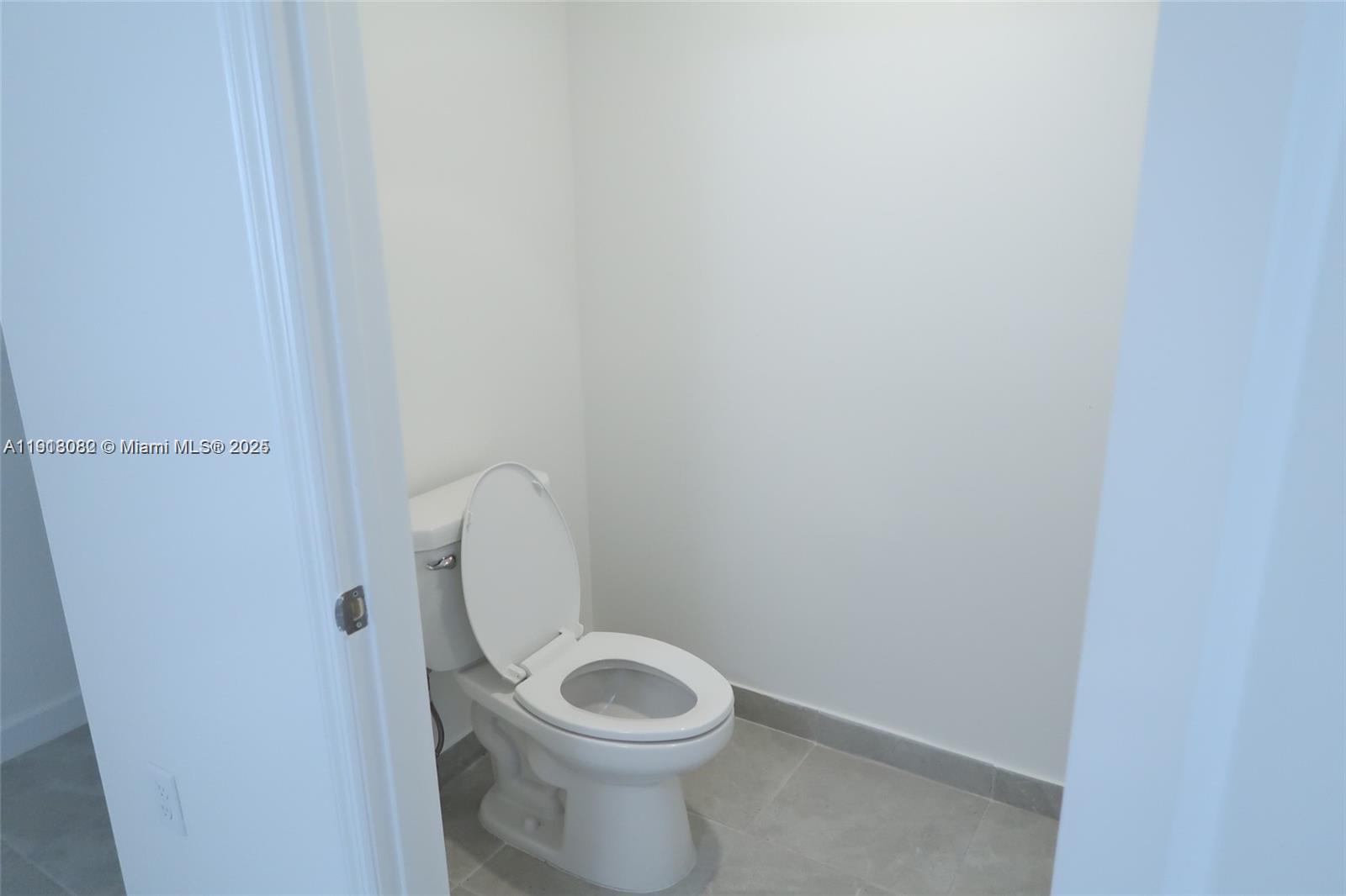 12946 Southwest 231st Street Miami, FL 33170 - Photo 21 of 42 a close view of a toilet and sink