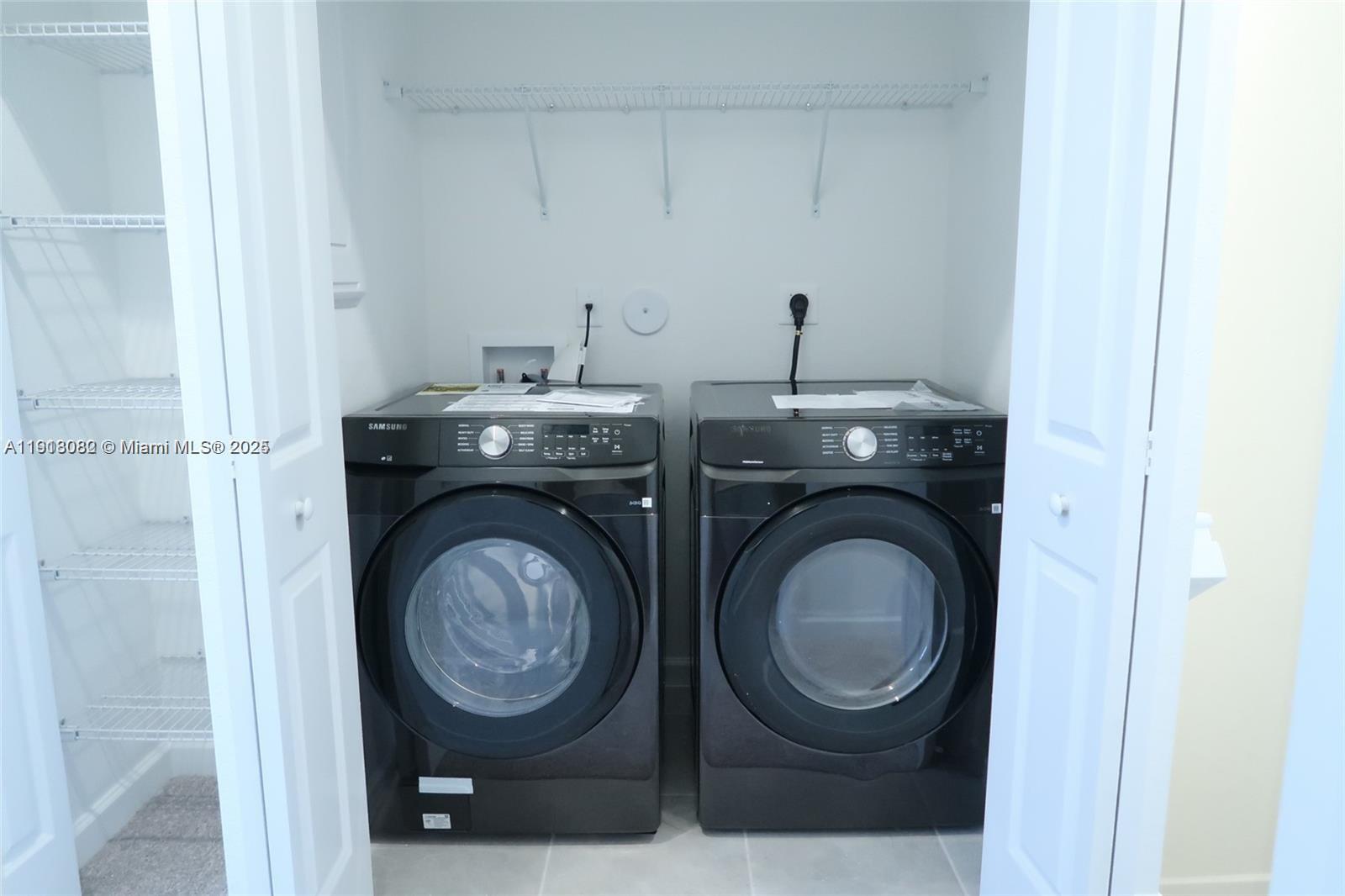 12946 Southwest 231st Street Miami, FL 33170 - Photo 30 of 42 a utility room with dryer and washer