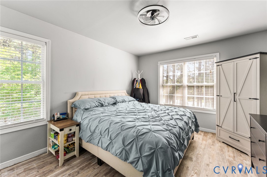 3120 Denise Road Petersburg, VA 23805 - Photo 36 of 51 Neutral wall paint, wood-finish flooring, two wind