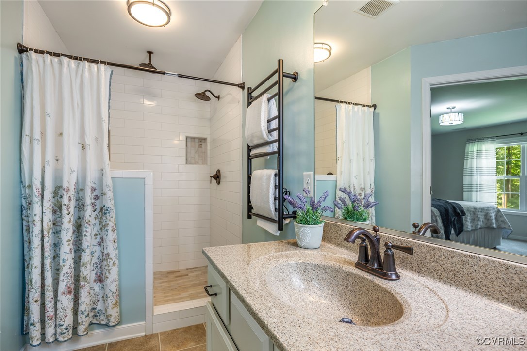 4672 Bell Road Powhatan, VA 23139 - Photo 27 of 34 Tile shower has shampoo nitch built in.