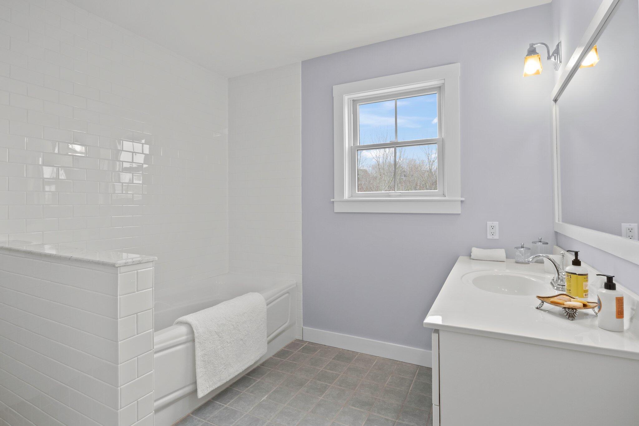 16 Meadow Road, Unit 16 Provincetown, MA 02657 - Photo 12 of 23 a bathroom with a sink and a window