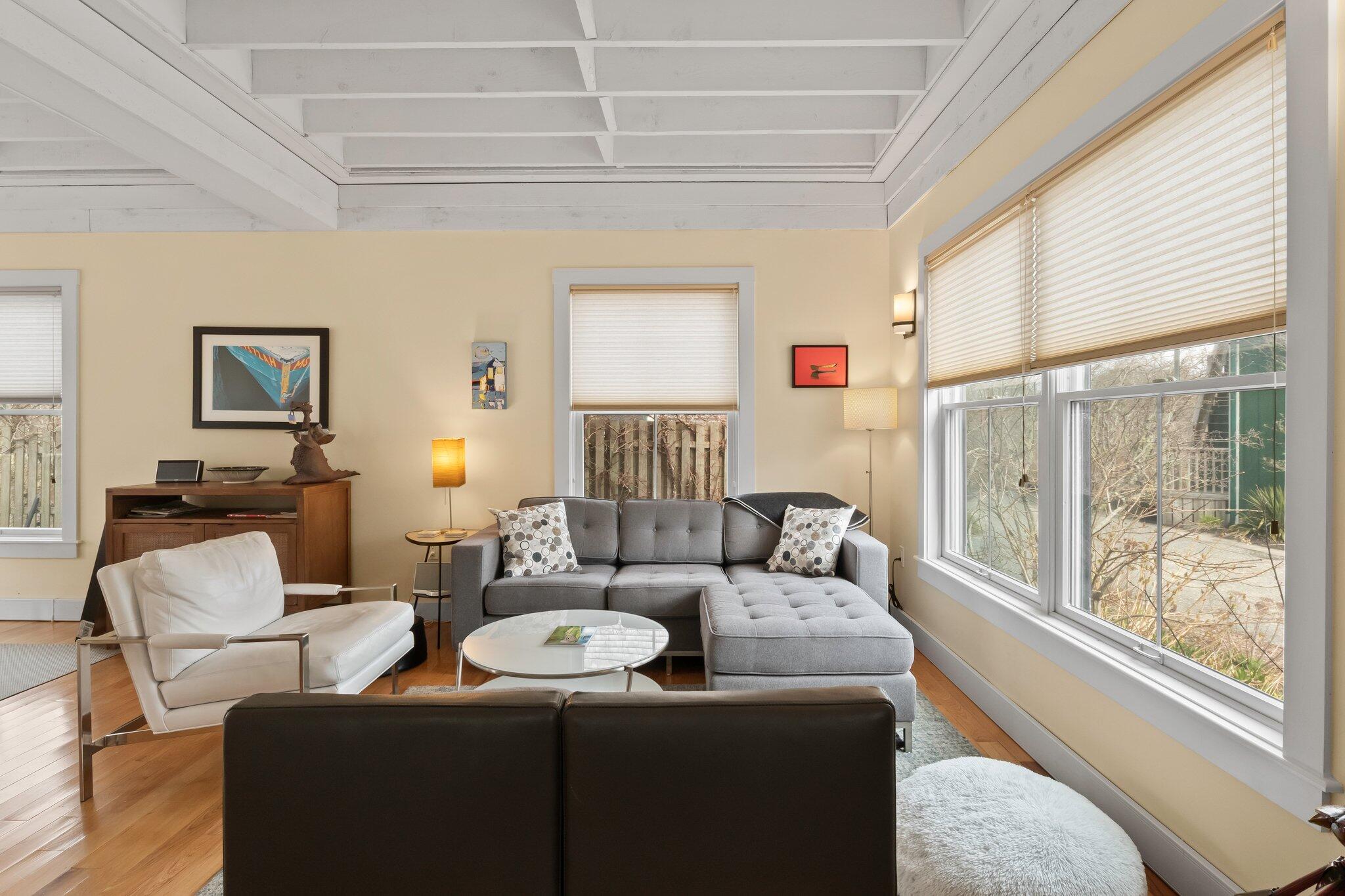 16 Meadow Road, Unit 16 Provincetown, MA 02657 - Photo 2 of 23 a living room with furniture and a large window