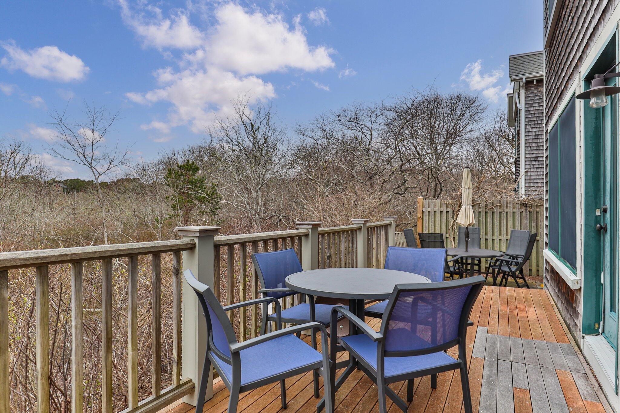 16 Meadow Road, Unit 16 Provincetown, MA 02657 - Photo 7 of 23 a view of balcony with furniture and stove