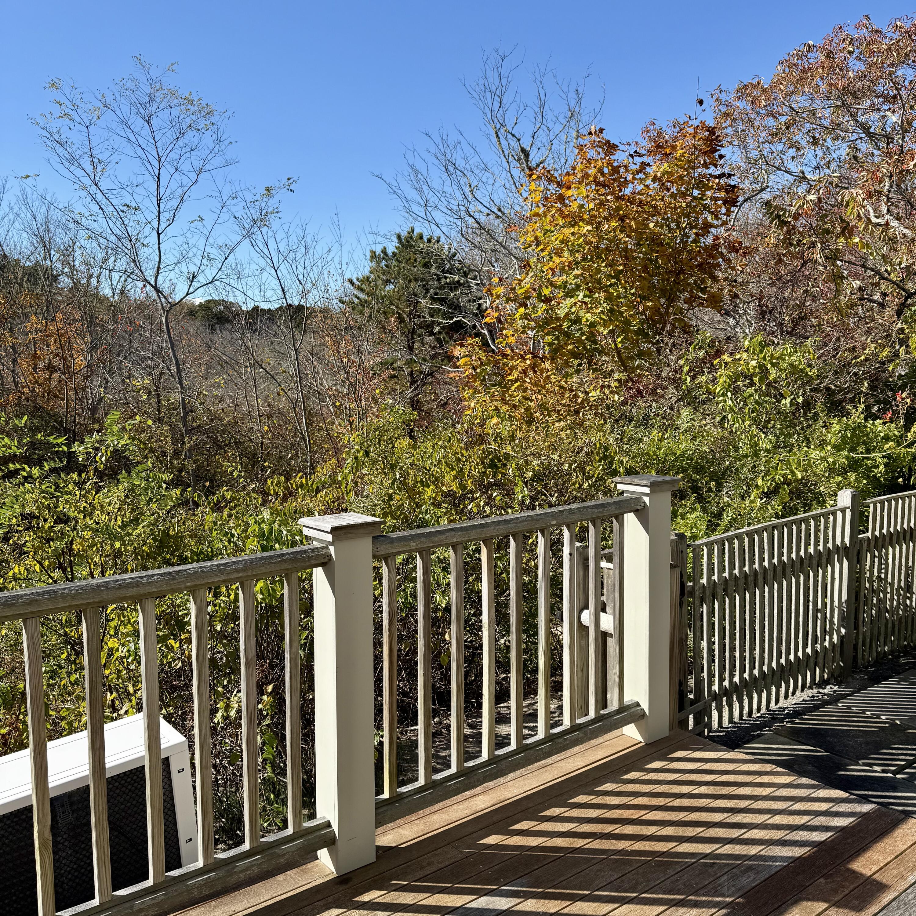 16 Meadow Road, Unit 16 Provincetown, MA 02657 - Photo 8 of 23 a view of a wooden fence