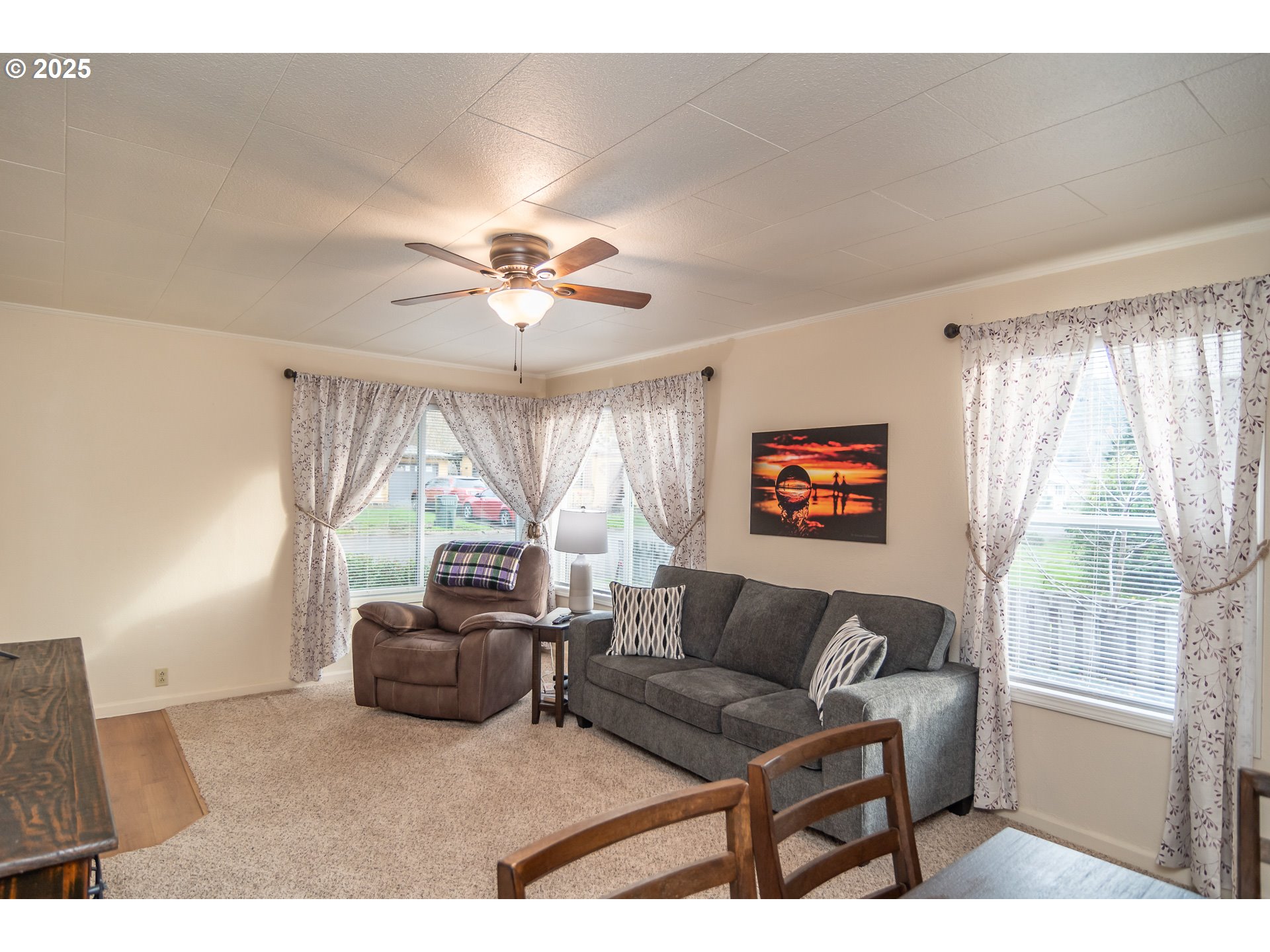 512 West Center Street Roseburg, OR 97471 - Photo 8 of 48 a living room with furniture and a large window