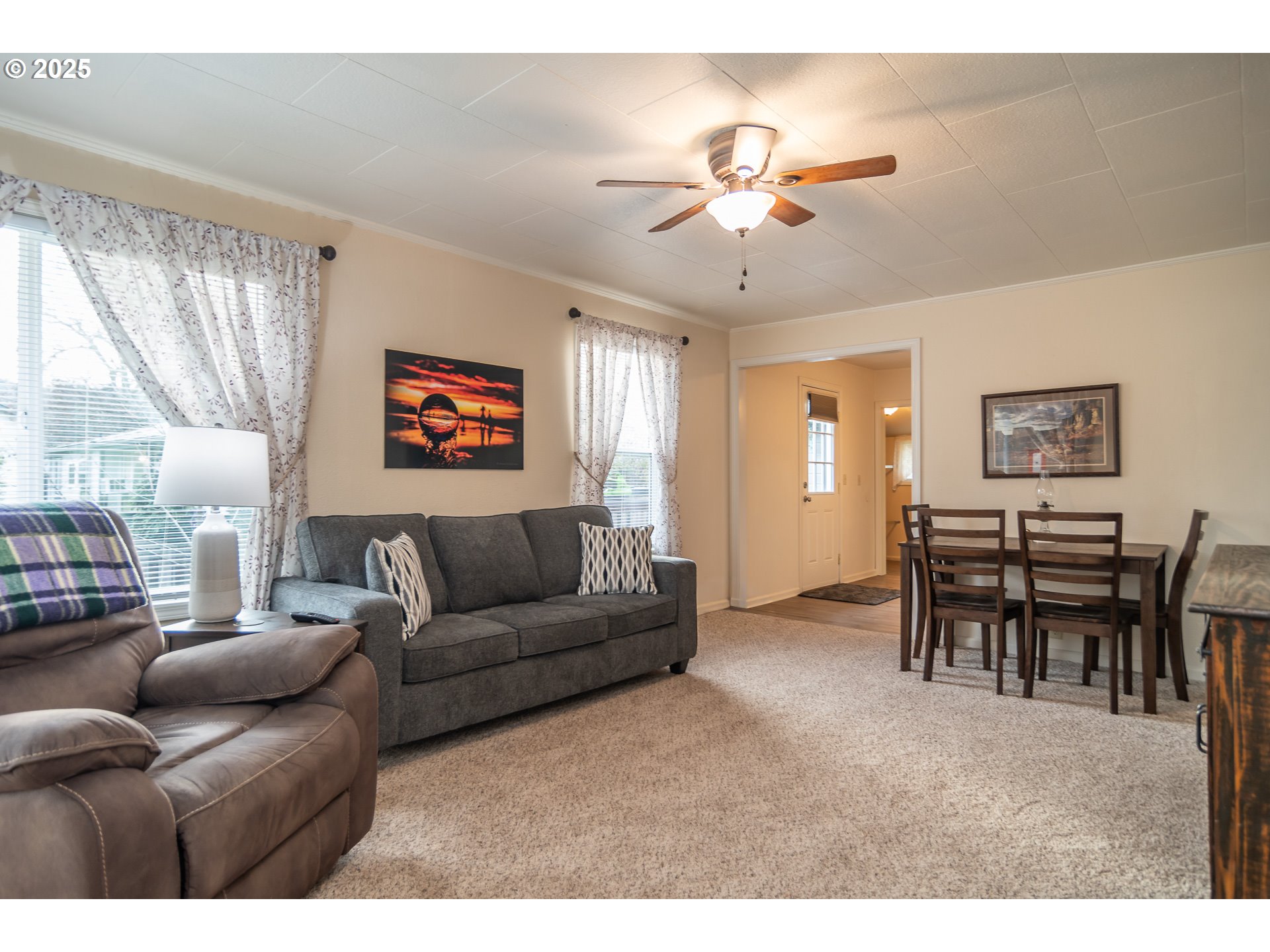 512 West Center Street Roseburg, OR 97471 - Photo 9 of 48 a living room with furniture and a window