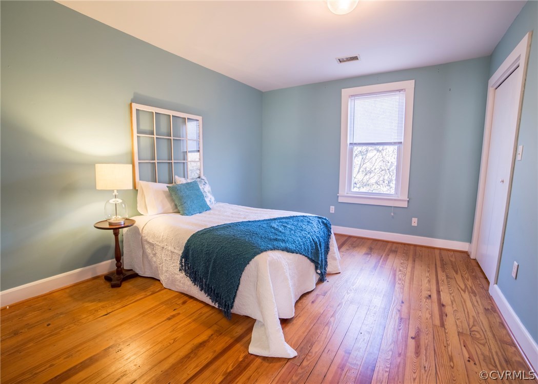 4450 Old Buckingham Road Powhatan, VA 23139 - Photo 14 of 30 Upstairs Bedroom showing beautiful floors and tons
