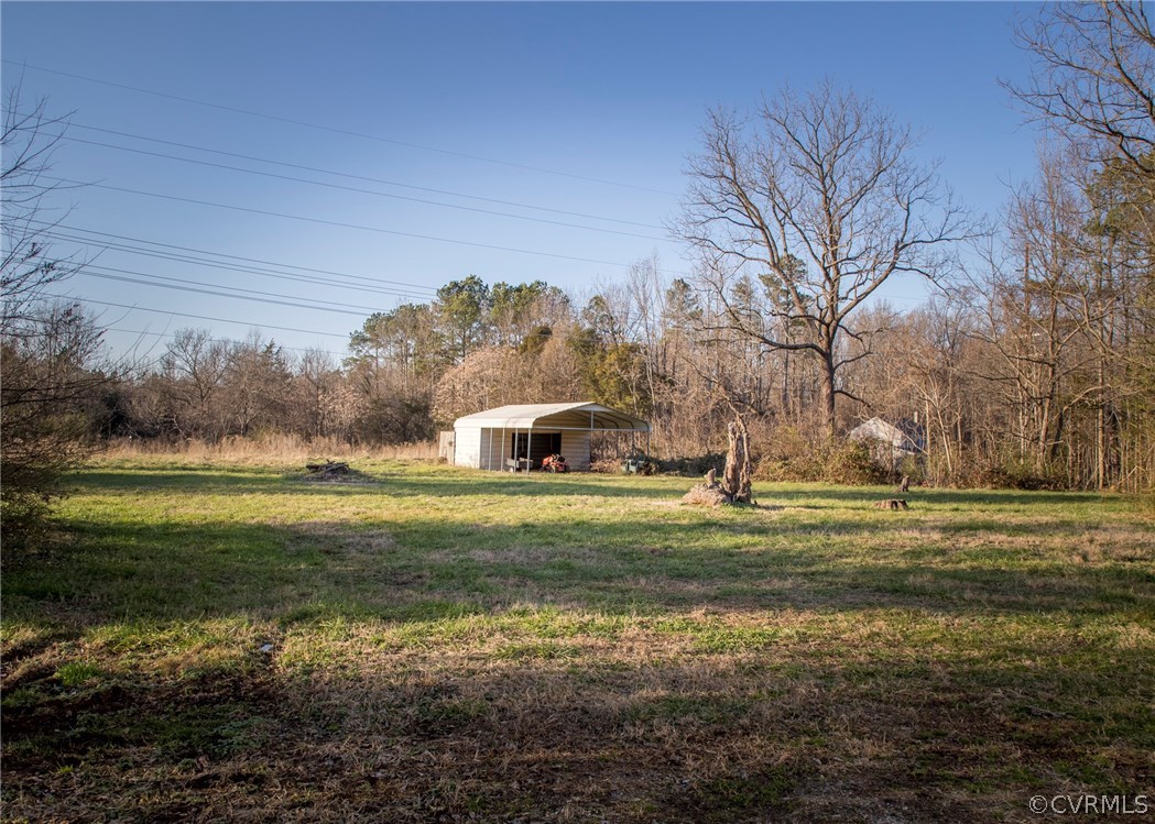 4450 Old Buckingham Road Powhatan, VA 23139 - Photo 23 of 30 Tons of storage in this shed behind the Farmhouse.