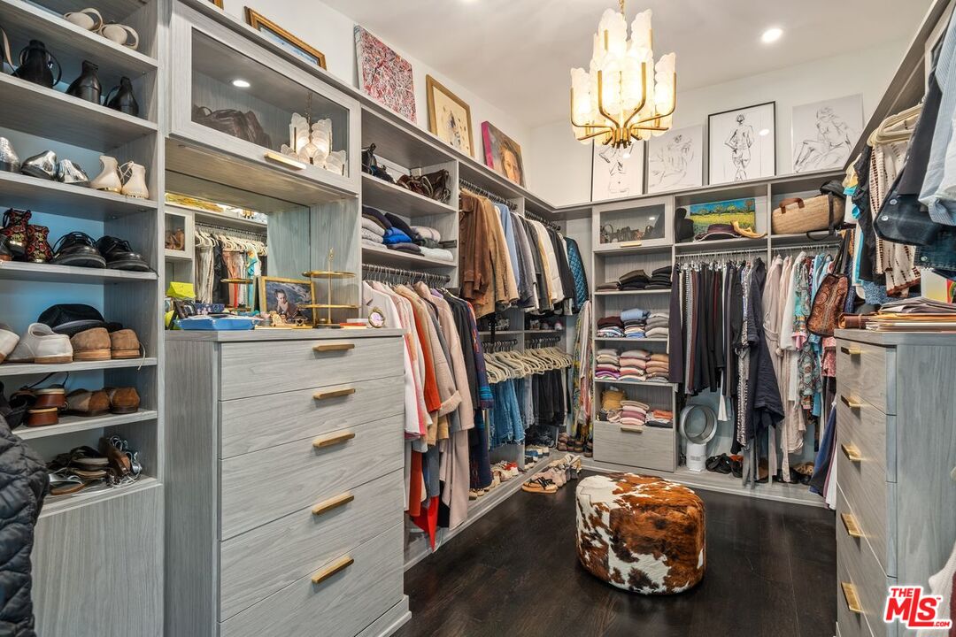 6237 Bonsall Drive Malibu, CA 90265 - Photo 18 of 50 a view of walk in closet with clothes and shoes