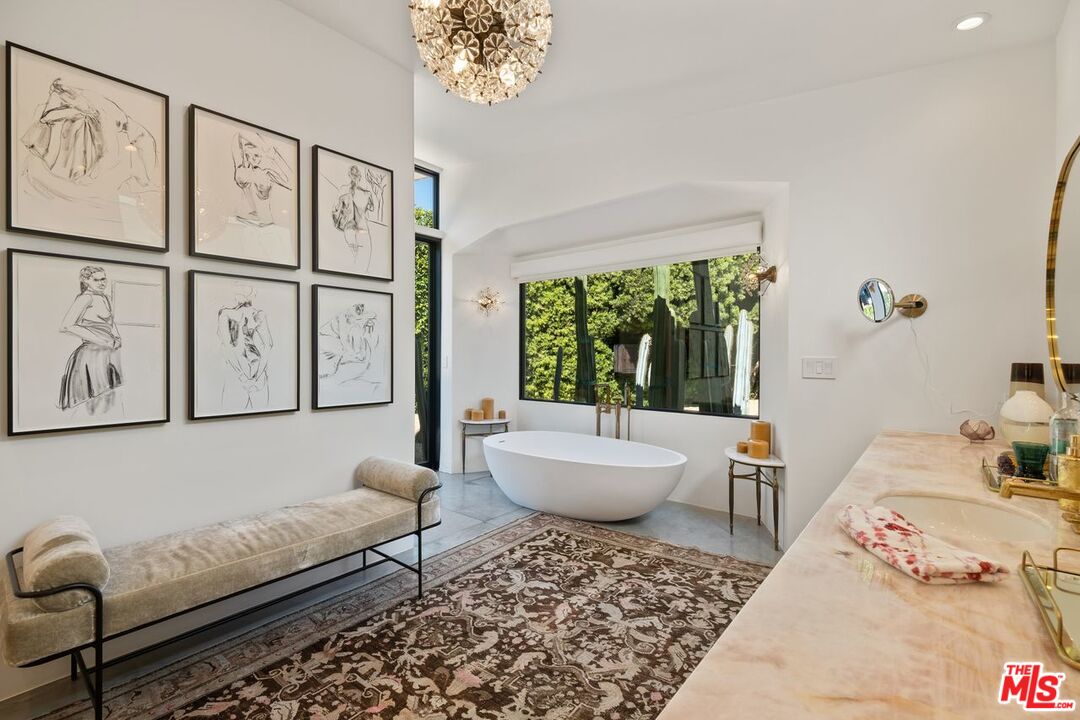 6237 Bonsall Drive Malibu, CA 90265 - Photo 19 of 50 a living room with furniture and a large window