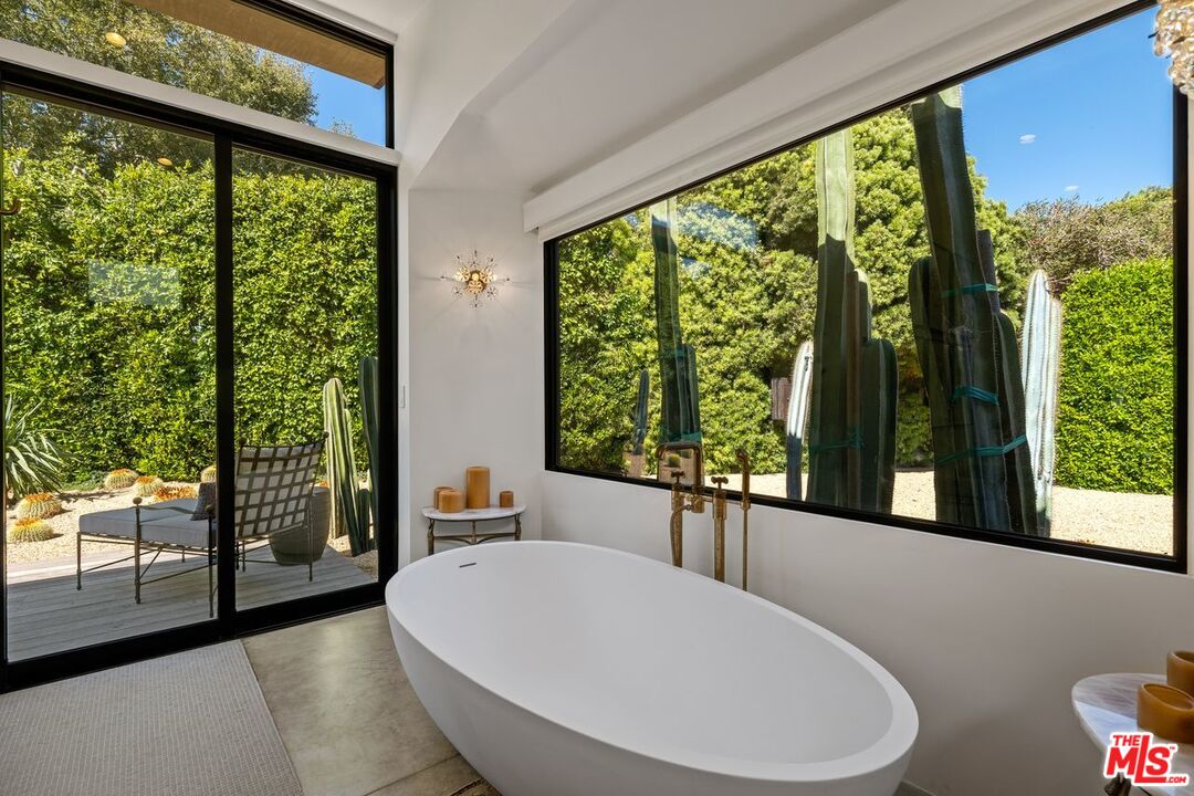 6237 Bonsall Drive Malibu, CA 90265 - Photo 21 of 50 a very nice looking room with a large window