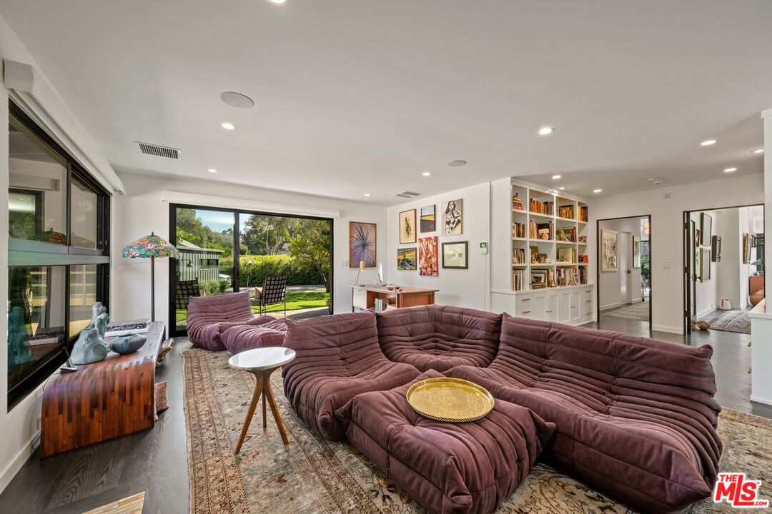 6237 Bonsall Drive Malibu, CA 90265 - Photo 25 of 50 a living room with furniture and a large window
