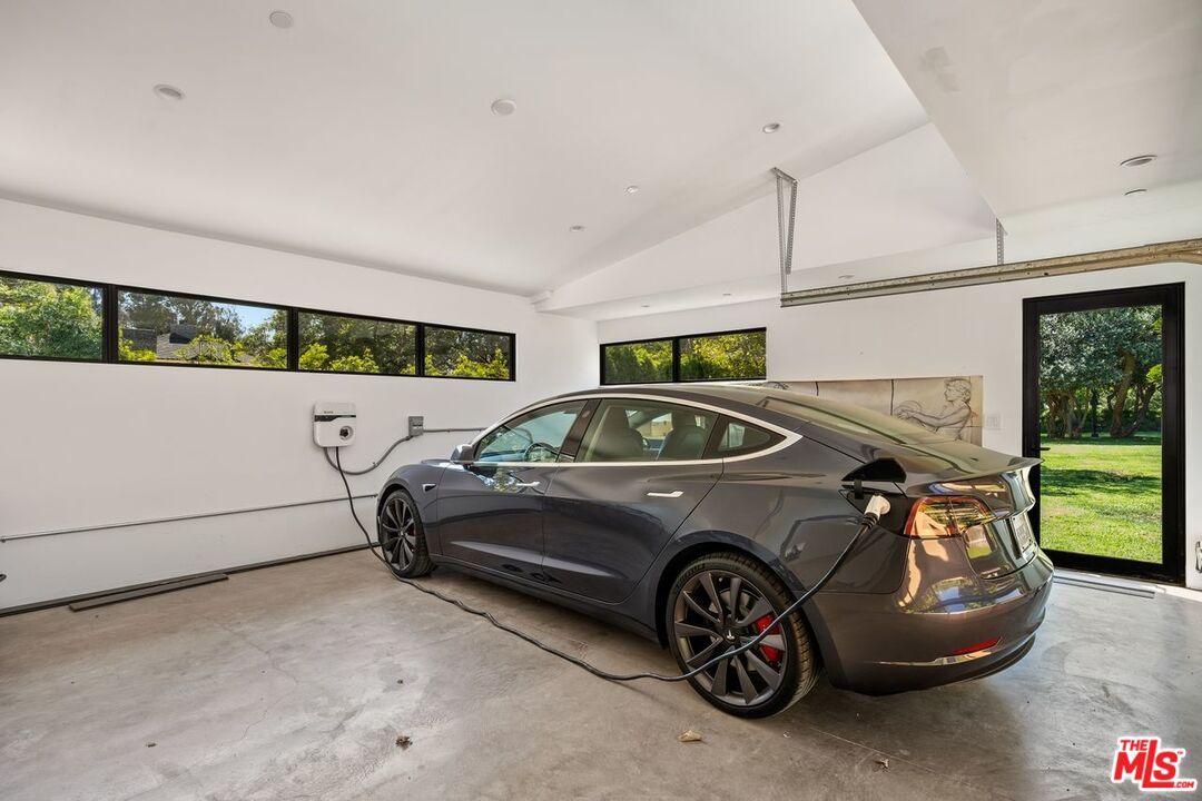 6237 Bonsall Drive Malibu, CA 90265 - Photo 50 of 50 a car parked in a garage