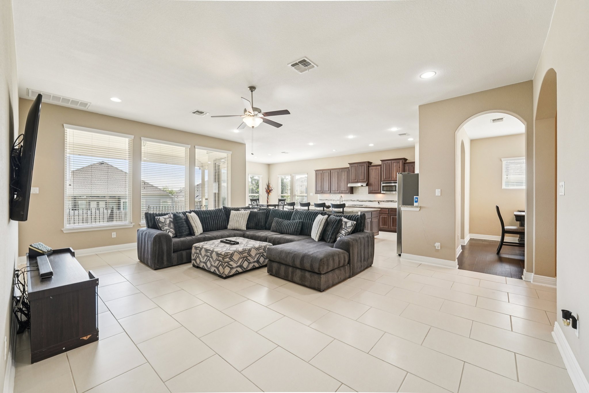 18117 Monarch Butterfly Way Pflugerville, TX 78660 - Photo 4 of 19 Designed for both entertaining and relaxation, this central space brings everyone together.