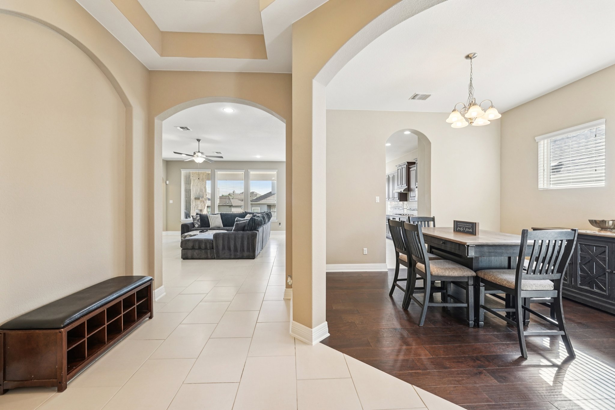 18117 Monarch Butterfly Way Pflugerville, TX 78660 - Photo 6 of 19 Natural light enhances the dining area, creating a warm and inviting setting.