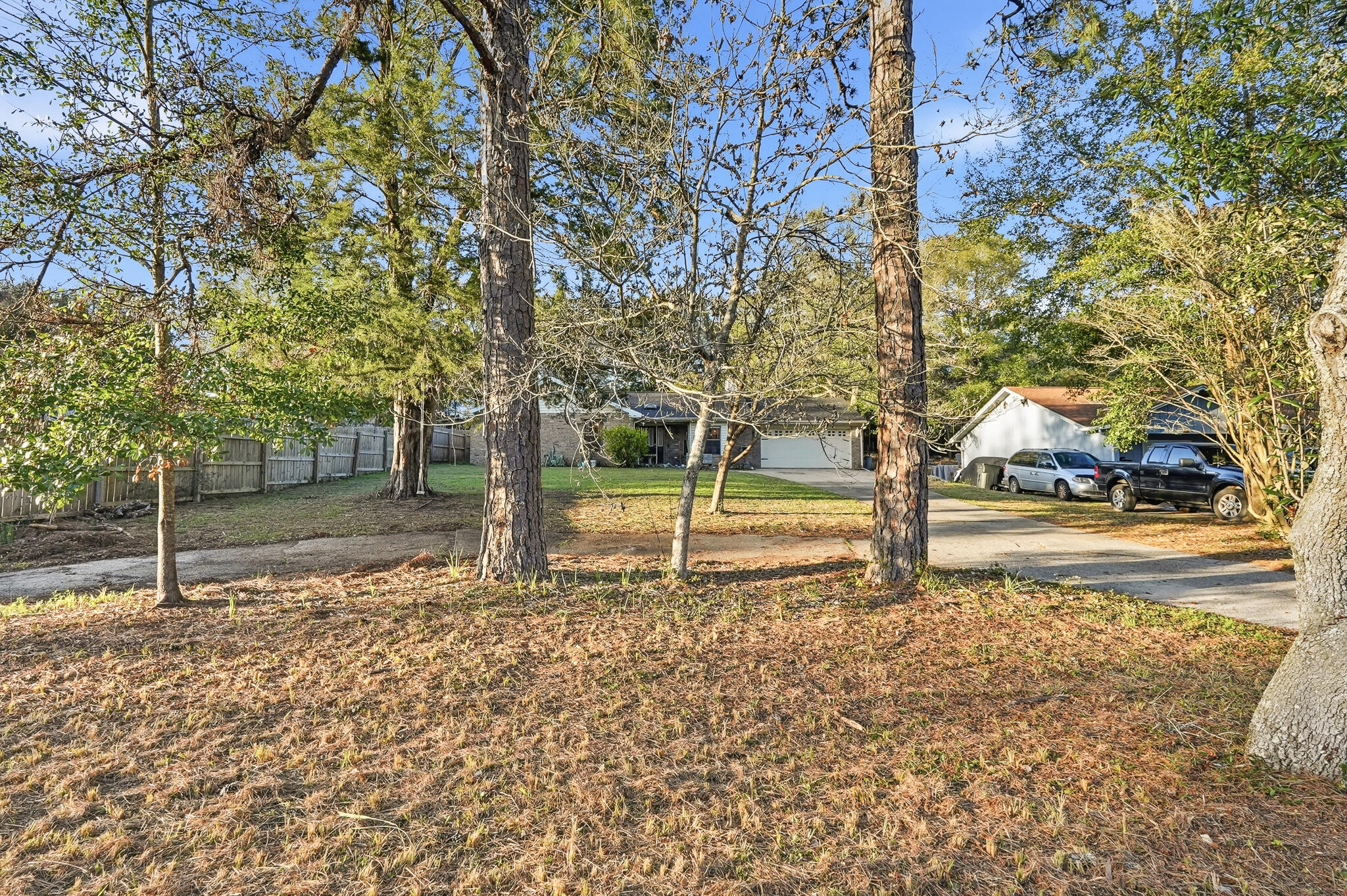 271 Willow Avenue Freeport, FL 32439 - Photo 15 of 57 a backyard of a house with lots of green space