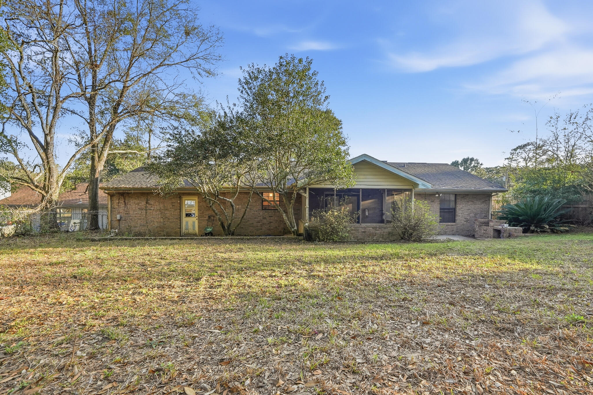 271 Willow Avenue Freeport, FL 32439 - Photo 16 of 57 a house with trees in front of it