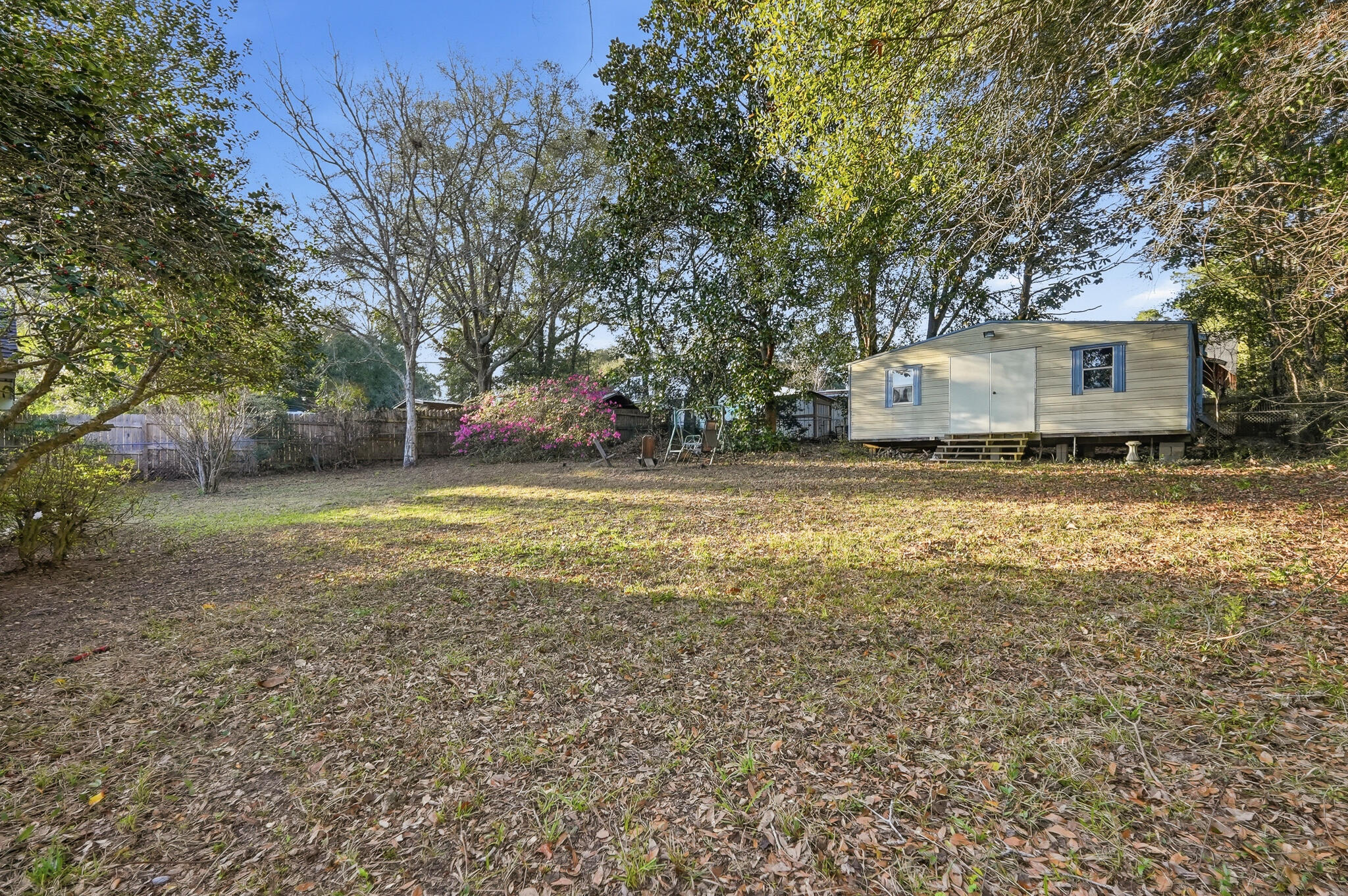 271 Willow Avenue Freeport, FL 32439 - Photo 18 of 57 a view of a house with a yard