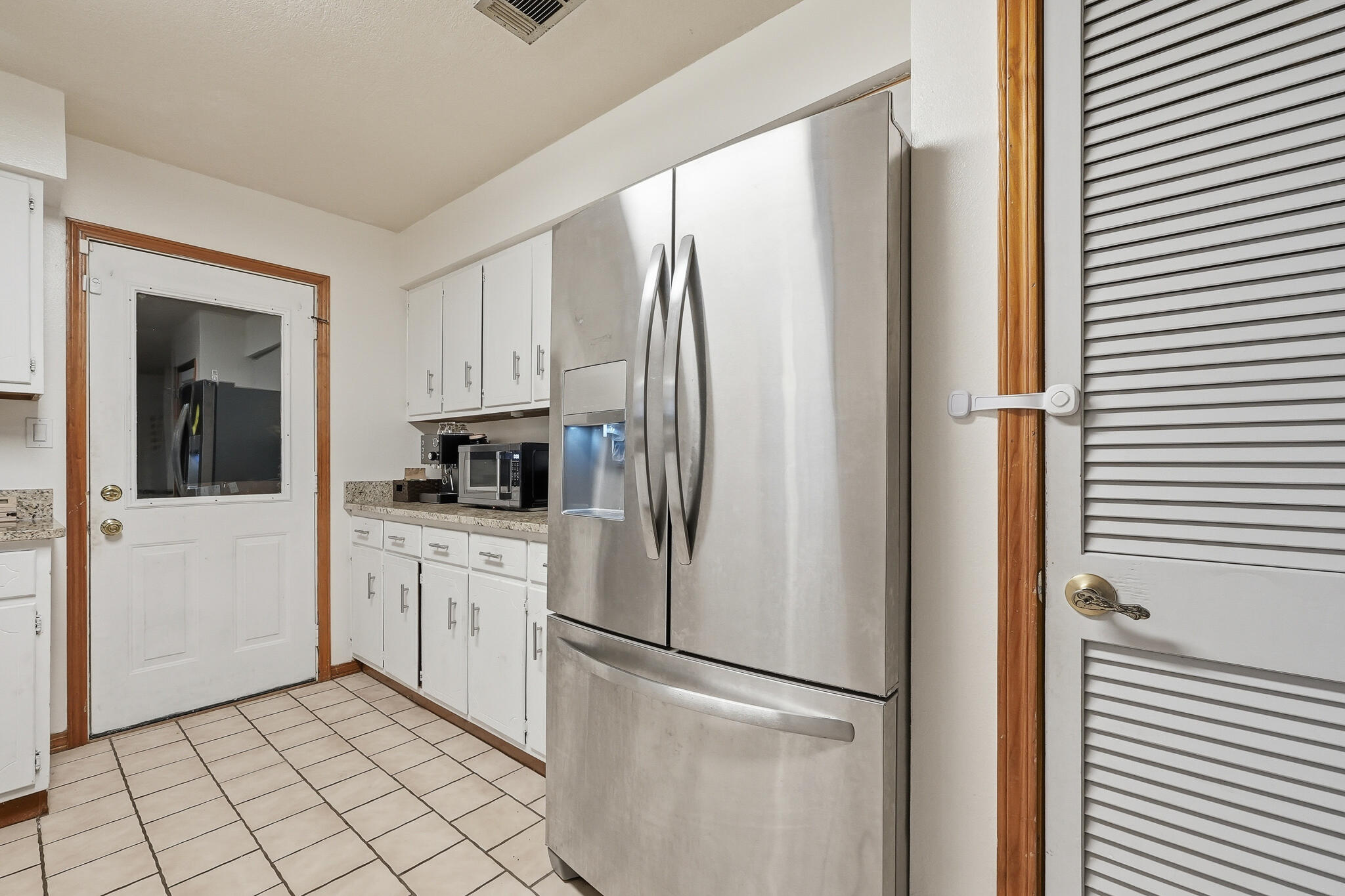 271 Willow Avenue Freeport, FL 32439 - Photo 32 of 57 a kitchen with stainless steel appliances a refrigerator and a sink