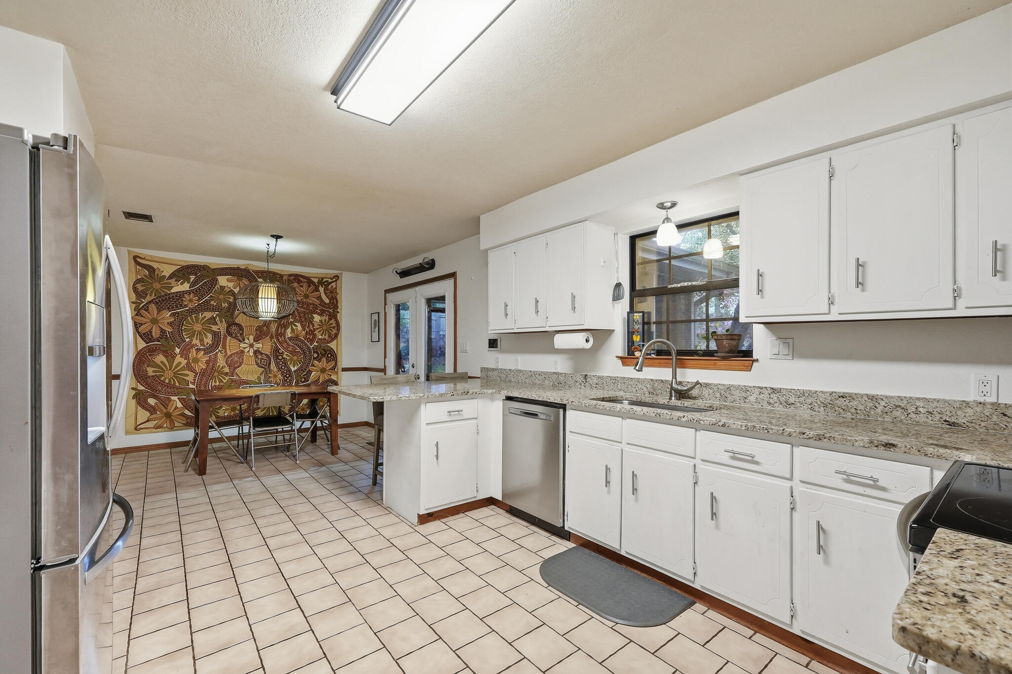 271 Willow Avenue Freeport, FL 32439 - Photo 35 of 57 a kitchen with sink cabinets and window