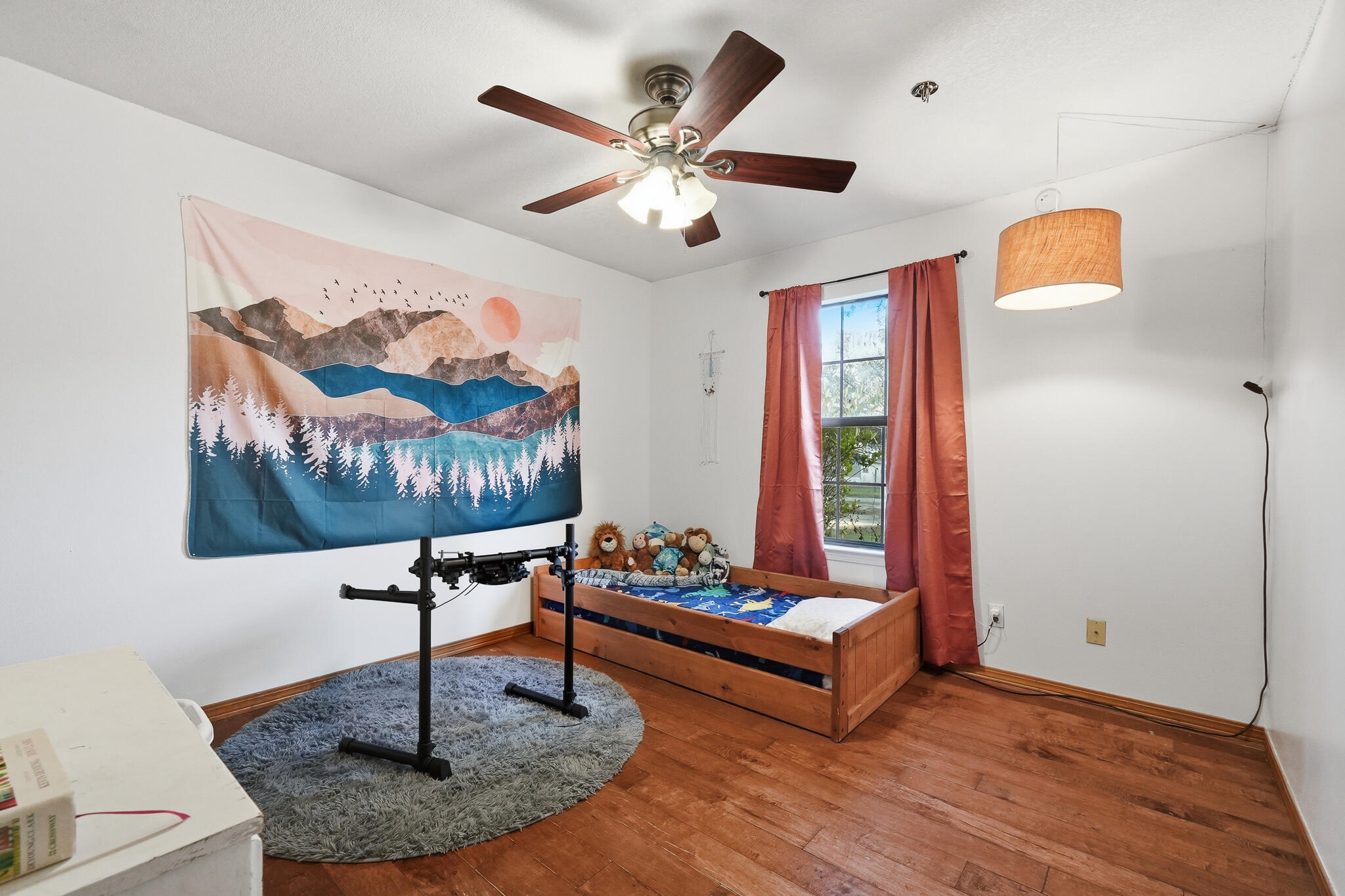 271 Willow Avenue Freeport, FL 32439 - Photo 53 of 57 a living room with furniture and a chandelier