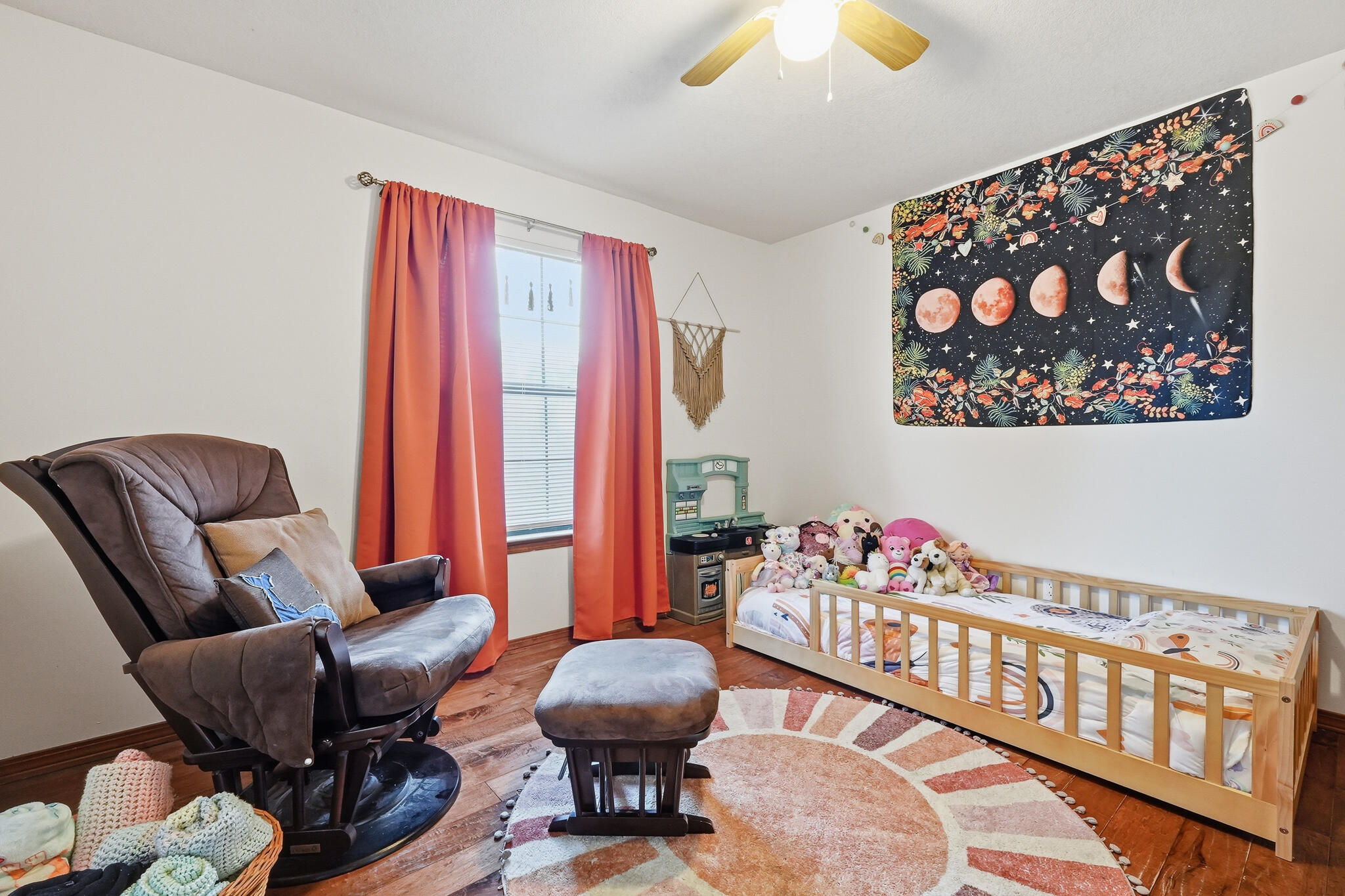 271 Willow Avenue Freeport, FL 32439 - Photo 55 of 57 a living room with furniture and baby crib