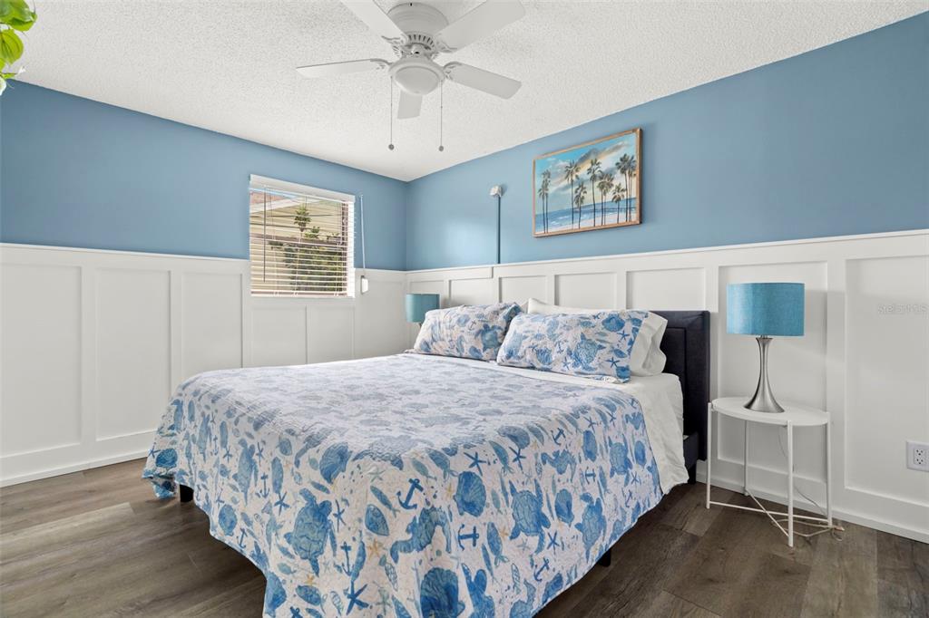 14030 79th Avenue Seminole, FL 33776 - Photo 21 of 33 a bedroom with bed and window