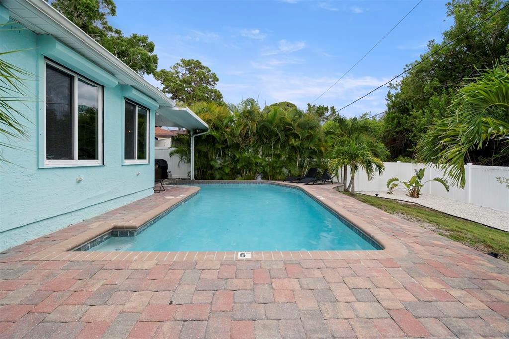 14030 79th Avenue Seminole, FL 33776 - Photo 28 of 33 a view of a backyard with a patio