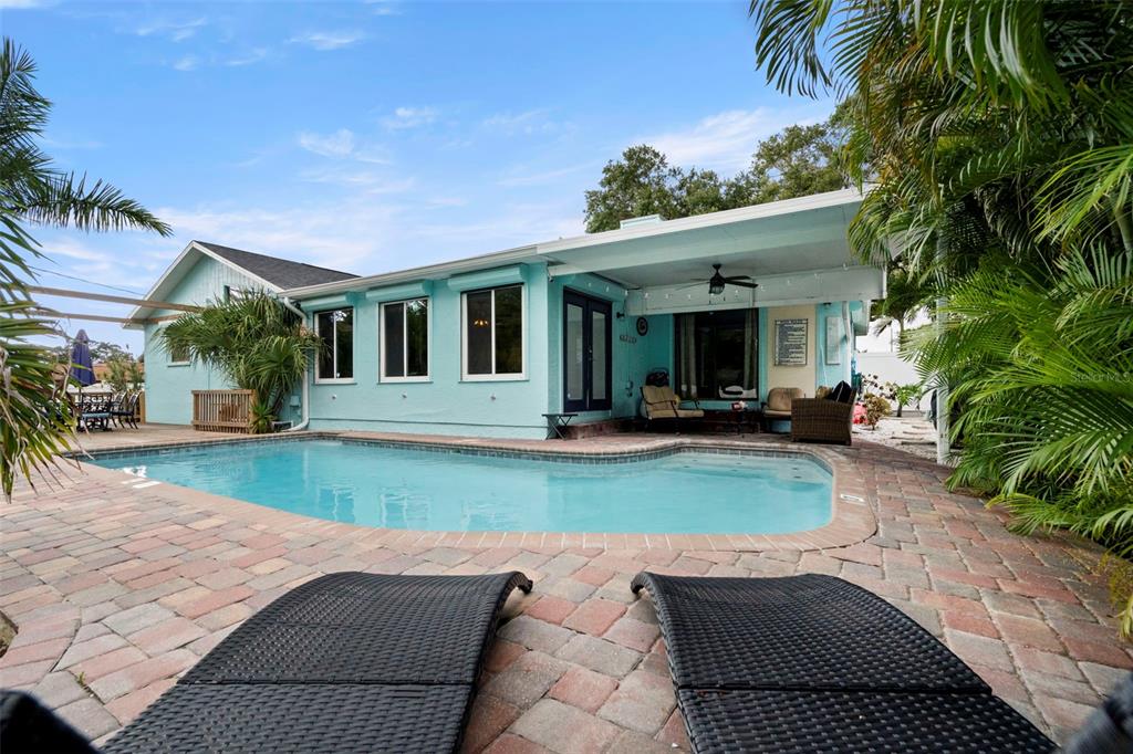 14030 79th Avenue Seminole, FL 33776 - Photo 3 of 33 a view of a house with backyard and porch