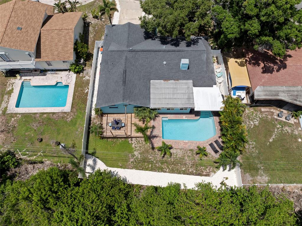 14030 79th Avenue Seminole, FL 33776 - Photo 32 of 33 an aerial view of a house with a yard