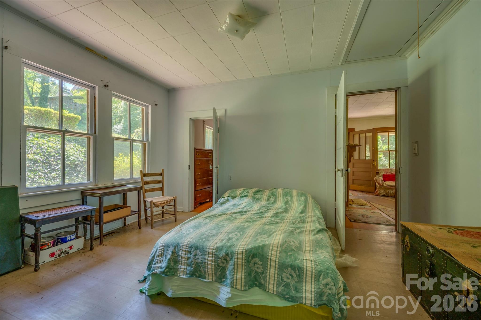 77 1st Street Tryon, NC 28782 - Photo 15 of 20 a bedroom with a bed and a window