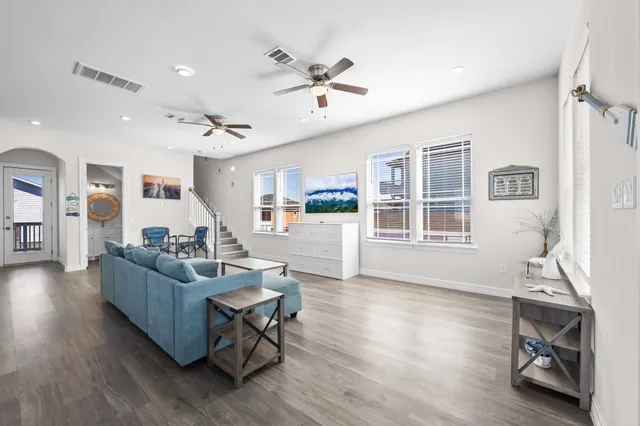 a view of a balcony with wooden floor