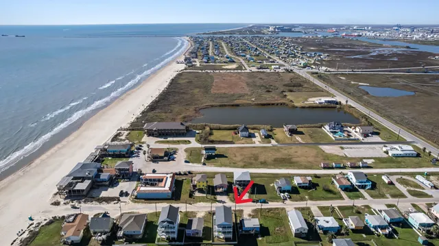 a front view of a house with parking space