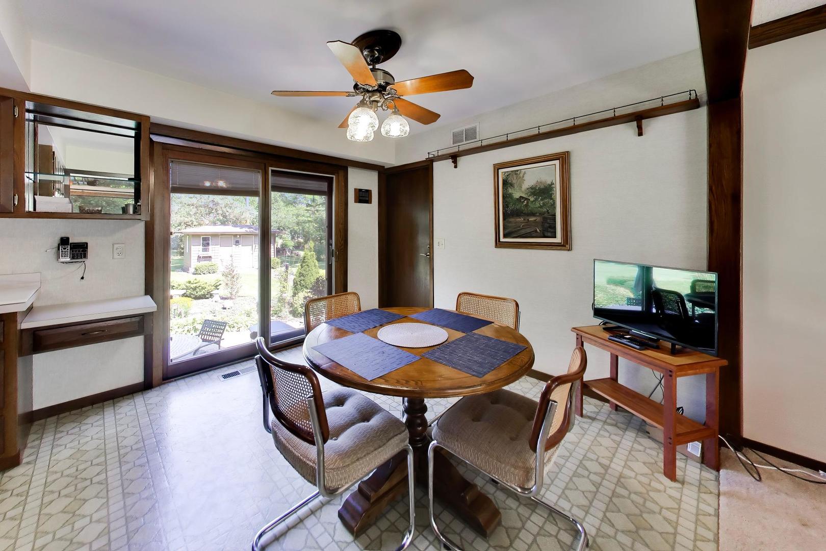 103 Cottonwood Road Northbrook, IL 60062 - Photo 12 of 50 a dining room with furniture and window