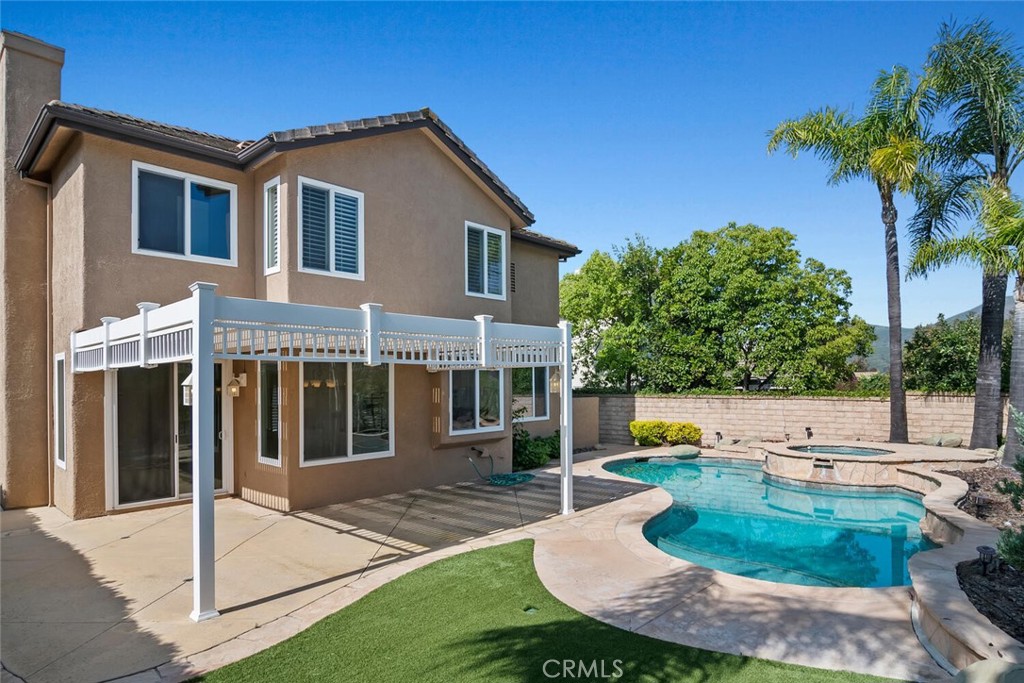 5149 Pesto Way Oak Park, CA 91377 - Photo 17 of 42 a front view of a house with garden