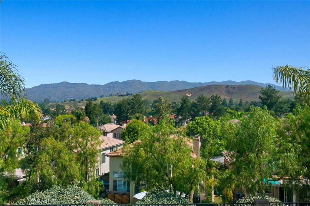 5149 Pesto Way Oak Park, CA 91377 - Photo 27 of 42 an aerial view of residential house with an outdoor space and mountain view