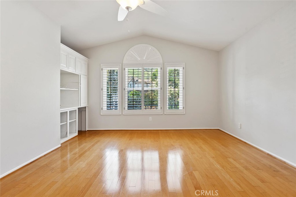 5149 Pesto Way Oak Park, CA 91377 - Photo 34 of 42 a view of empty room with wooden floor and fan