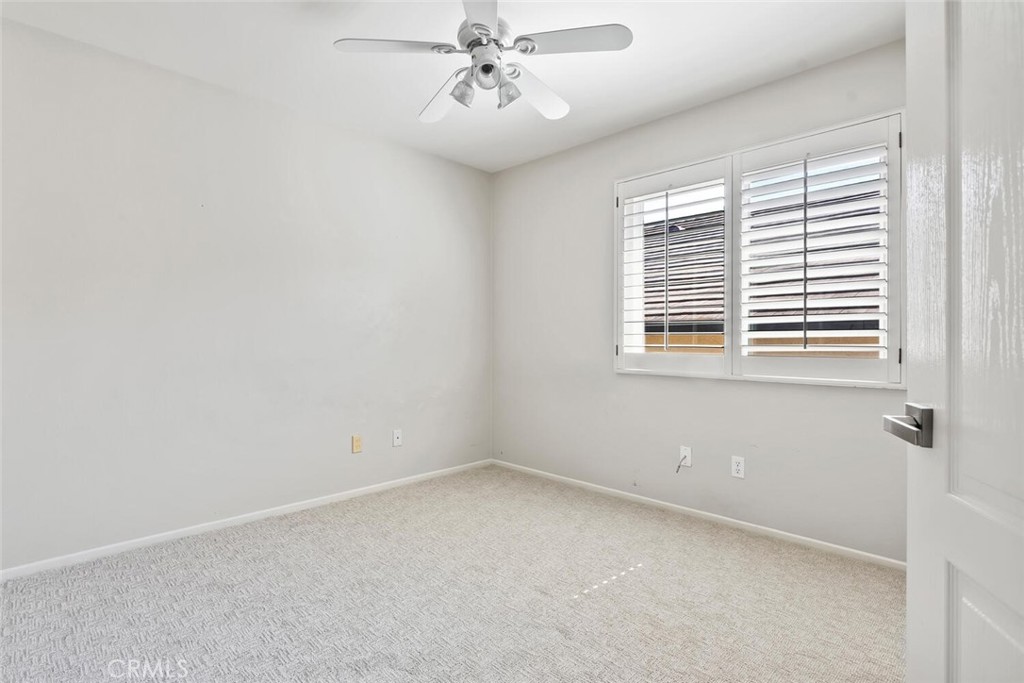 5149 Pesto Way Oak Park, CA 91377 - Photo 40 of 42 an empty room with windows and fan