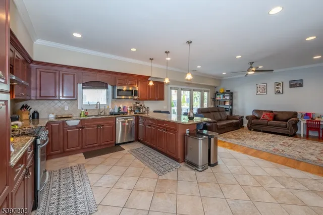 a kitchen with stainless steel appliances lots of counter top space