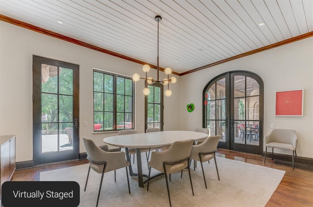 4120 Cochran Chapel Road Dallas, TX 75220 - Photo 14 of 39 a dining room with furniture a chandelier and wooden floor