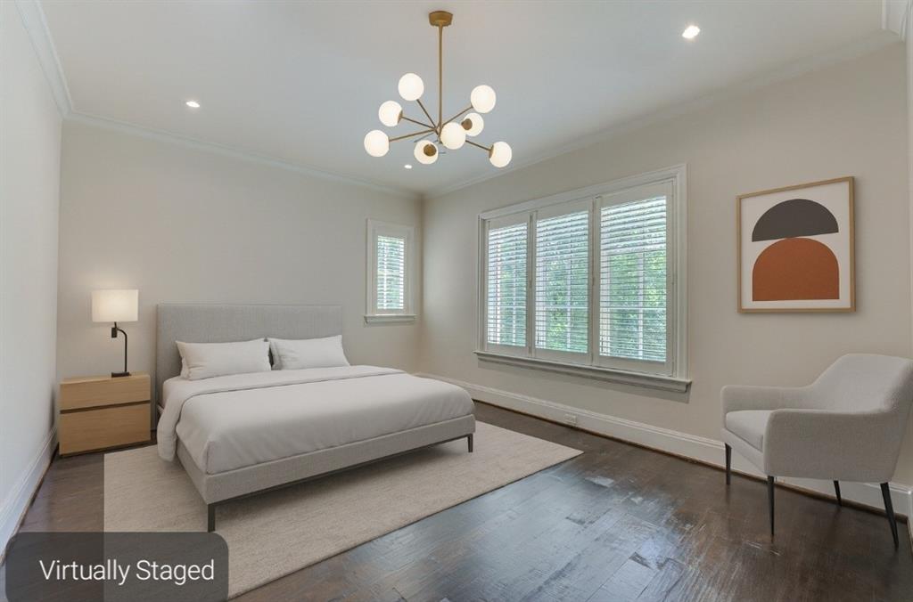 4120 Cochran Chapel Road Dallas, TX 75220 - Photo 21 of 39 a bedroom with a bed and a chair