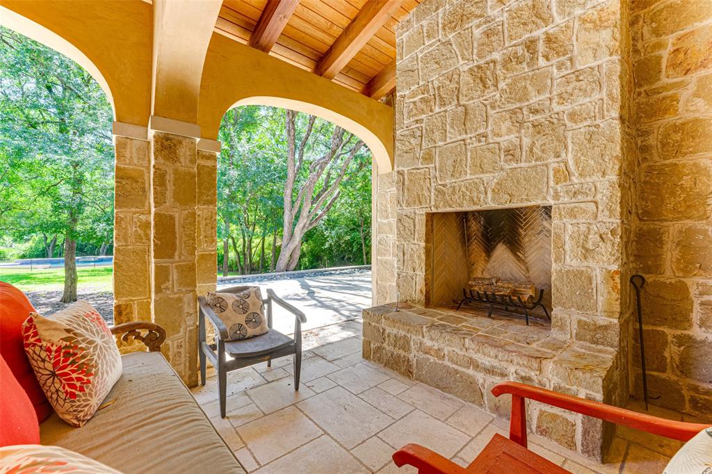 4120 Cochran Chapel Road Dallas, TX 75220 - Photo 27 of 39 a outdoor living space with furniture and a fireplace