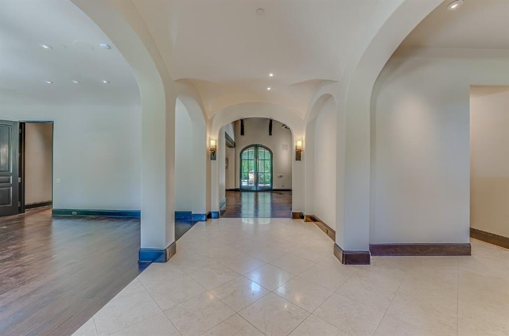 4120 Cochran Chapel Road Dallas, TX 75220 - Photo 4 of 39 a bedroom with a bed and a window