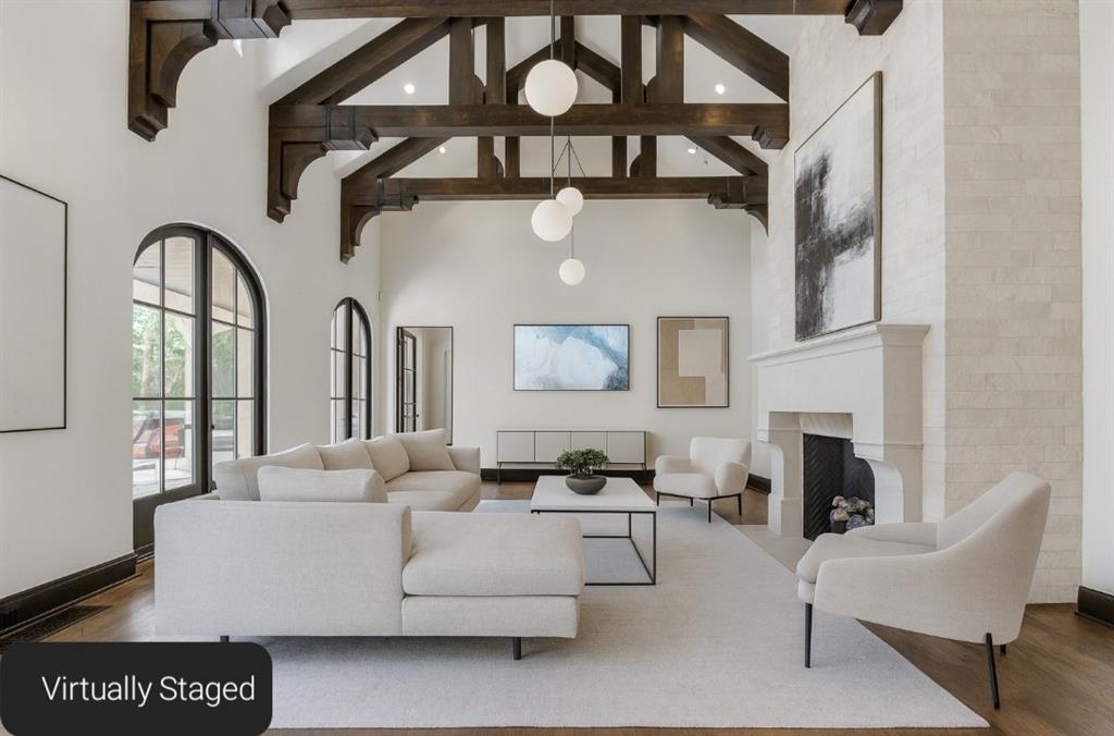 4120 Cochran Chapel Road Dallas, TX 75220 - Photo 6 of 39 a living room with furniture a fireplace and white walls