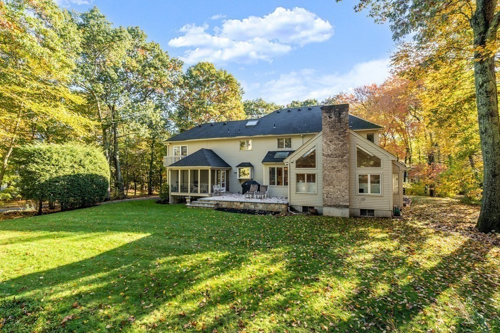 17 Lantern Road Framingham, MA 01702 - Photo 19 of 19 a front view of a house with a garden