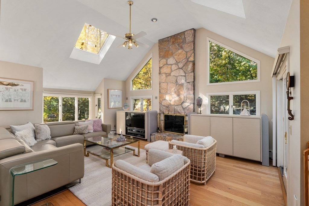 17 Lantern Road Framingham, MA 01702 - Photo 4 of 19 a living room with fireplace furniture and a large window