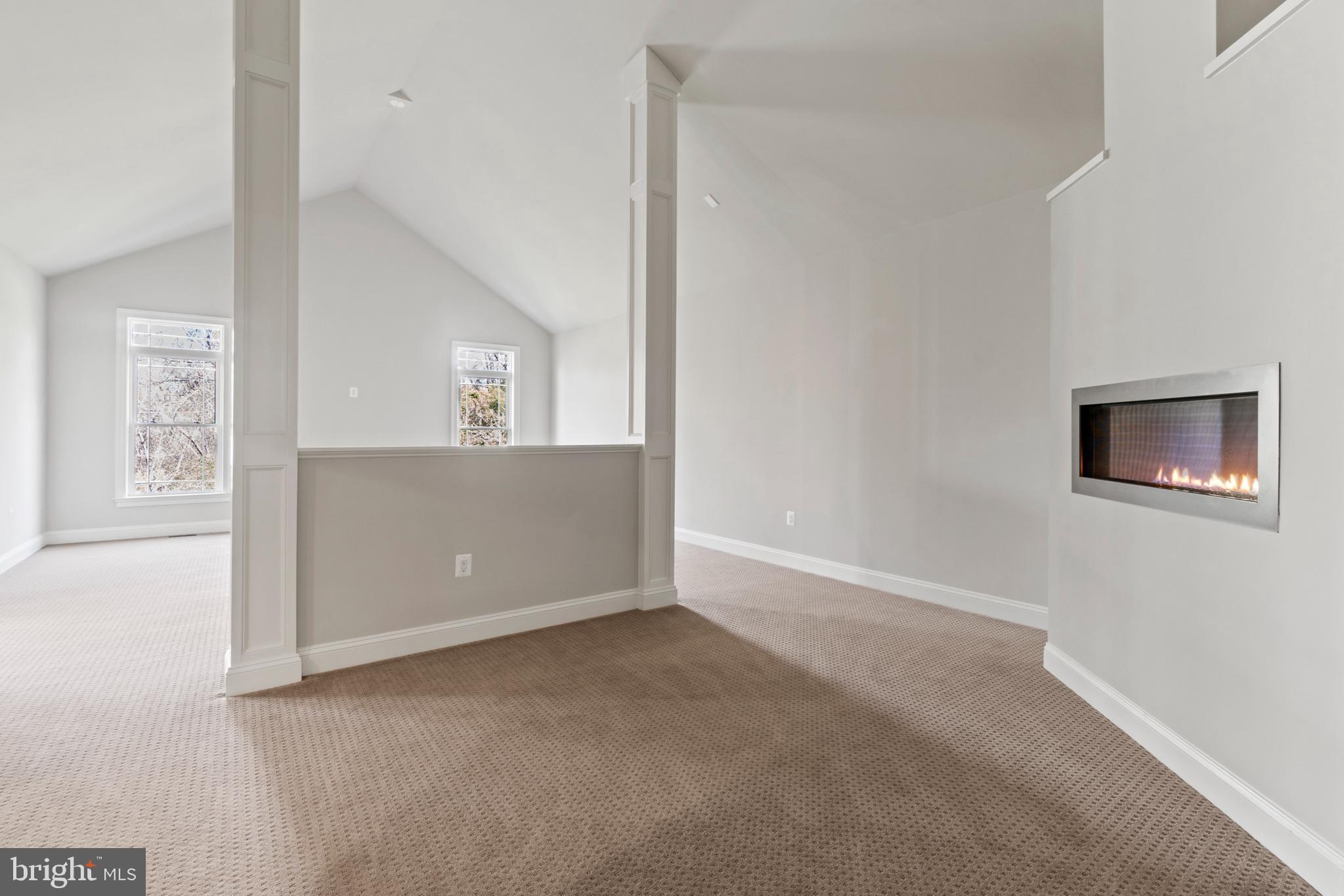 13725 Orlando Road Nokesville, VA 20181 - Photo 31 of 65 an empty room with windows and cabinet