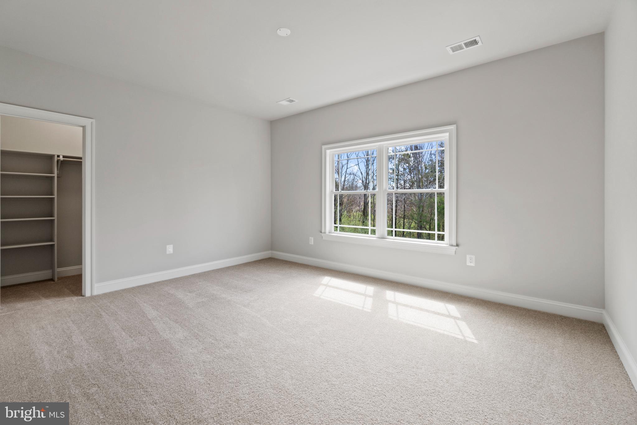 13725 Orlando Road Nokesville, VA 20181 - Photo 46 of 65 a view of an empty room with a window