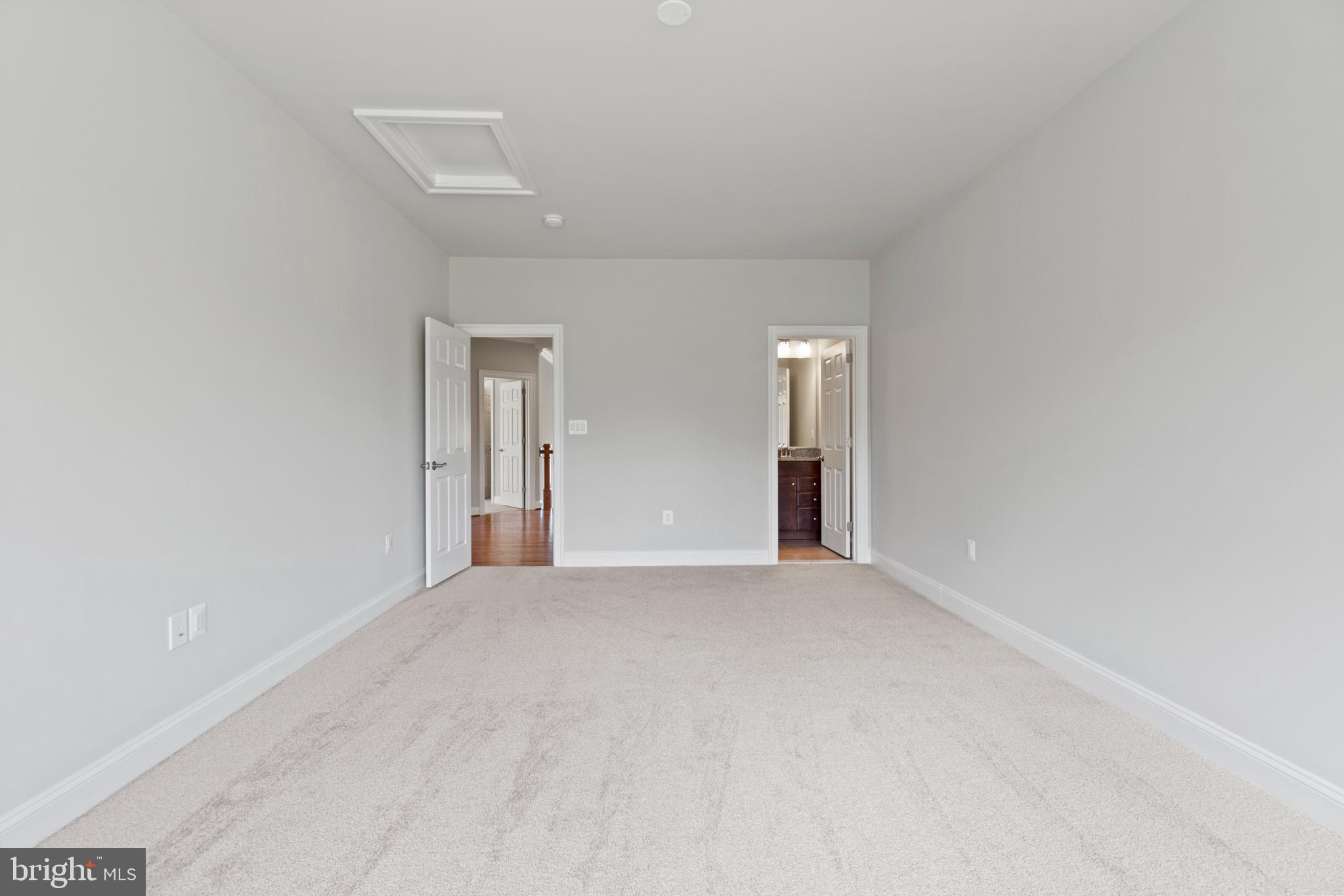 13725 Orlando Road Nokesville, VA 20181 - Photo 52 of 65 a view of an empty room with wooden floor